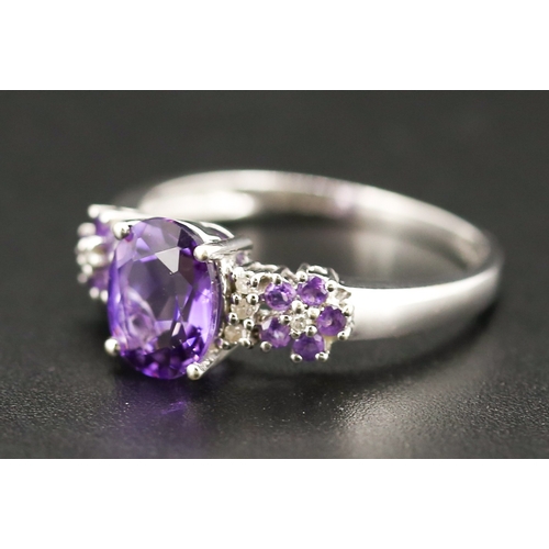 52 - Finely Detailed Amethyst Set Cluster Ring with Further Diamond Insets Mounted in 9 Carat White Gold ... 