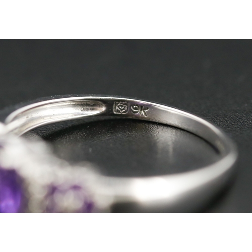 52 - Finely Detailed Amethyst Set Cluster Ring with Further Diamond Insets Mounted in 9 Carat White Gold ... 