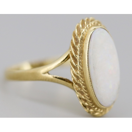 59 - Opal Bezel Set Single Stone Ring Mounted in 9 Carat Yellow Gold Ring Size Q
