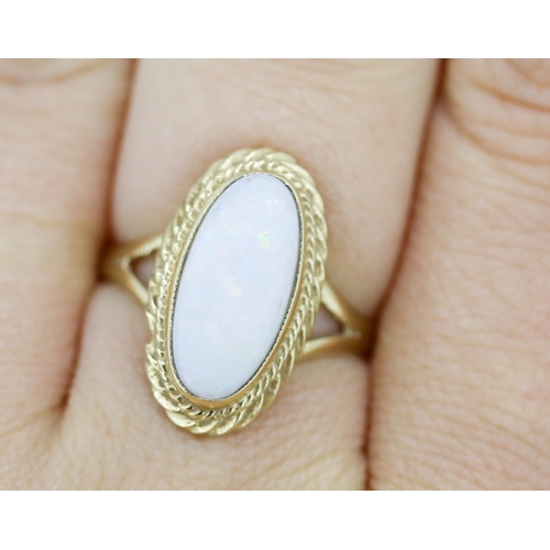 59 - Opal Bezel Set Single Stone Ring Mounted in 9 Carat Yellow Gold Ring Size Q