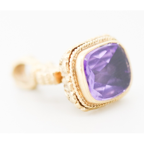 61 - Finely Detailed Amethyst Set Fob Pendant Mounted in 9 Carat Yellow Gold 2.5cm