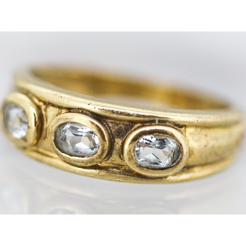 8 - Aquamarine Bezel Set Three Stone Ring Mounted in 9 Carat Yellow Gold Ring Size L