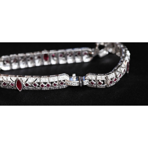 12 - Finely Detailed Marquise and Round Cut Ruby and Diamond Cluster Set Bracelet Mounted in 18 Carat Whi... 
