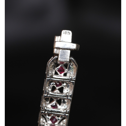 12 - Finely Detailed Marquise and Round Cut Ruby and Diamond Cluster Set Bracelet Mounted in 18 Carat Whi... 