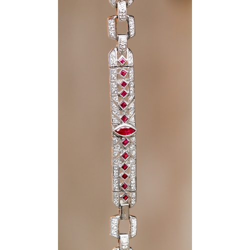 12 - Finely Detailed Marquise and Round Cut Ruby and Diamond Cluster Set Bracelet Mounted in 18 Carat Whi... 