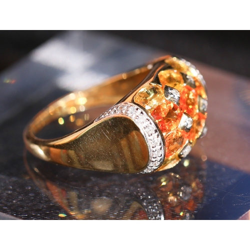 13 - Attractively Detailed Yellow and Orange Sapphire Twelve Stone Set Ring with Diamond Inset and Furthe... 