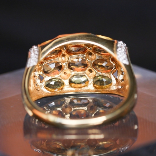 13 - Attractively Detailed Yellow and Orange Sapphire Twelve Stone Set Ring with Diamond Inset and Furthe... 