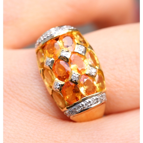 13 - Attractively Detailed Yellow and Orange Sapphire Twelve Stone Set Ring with Diamond Inset and Furthe... 