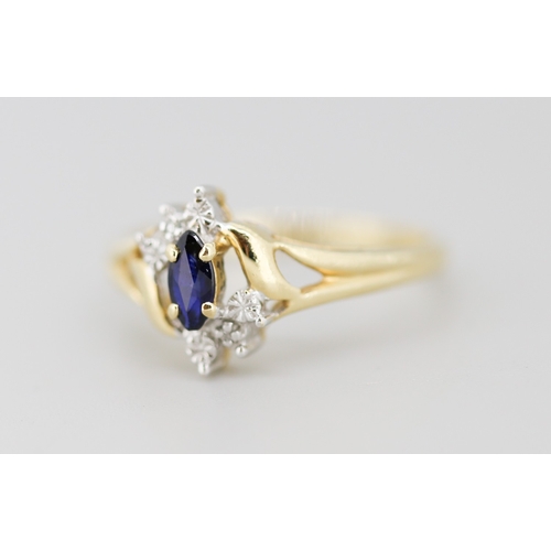 16 - Attractively Detailed Marquise Cut Sapphire Set Ring with Diamond Inset Mounted in 10 Carat Yellow G... 