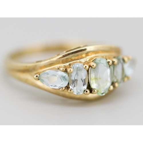 18 - Oval and Pear Cut Aquamarine Set Five Stone Ring Mounted in 9 Carat Yellow Gold Ring Size K and a Ha... 