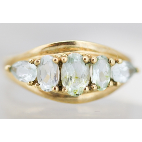 18 - Oval and Pear Cut Aquamarine Set Five Stone Ring Mounted in 9 Carat Yellow Gold Ring Size K and a Ha... 