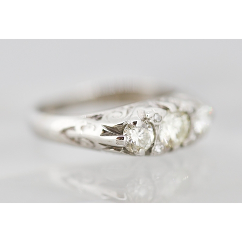 2 - Diamond Three Stone Ring Mounted in 18 Carat White Gold Incised Detailing Total Diamond Carat Weight... 
