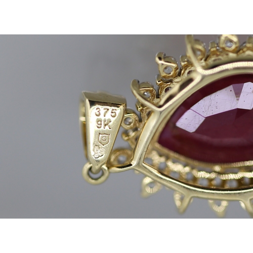 22 - Attractively Detailed Pear Cut Ruby Set Pendant with Gemstone Set Double Halo Surround Mounted in 9 ... 