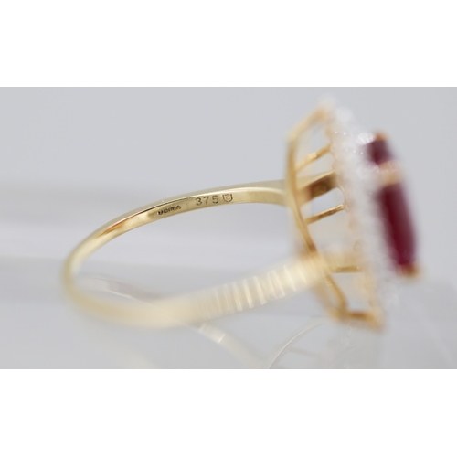23 - Ruby Centre Stone Ring with Gemstone Set Double Halo Surround Mounted in 9 Carat Yellow Gold Ring Si... 