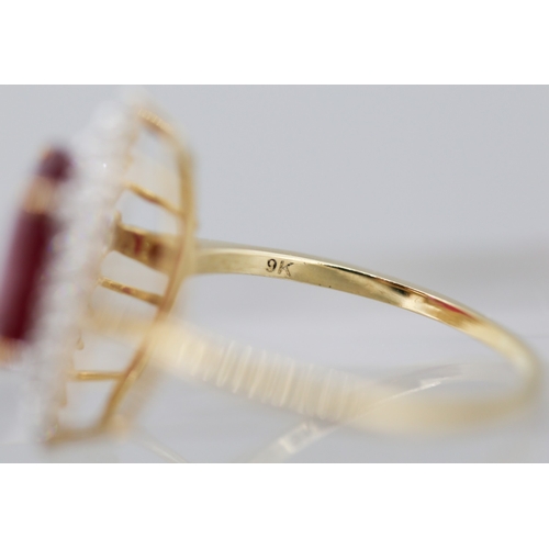 23 - Ruby Centre Stone Ring with Gemstone Set Double Halo Surround Mounted in 9 Carat Yellow Gold Ring Si... 