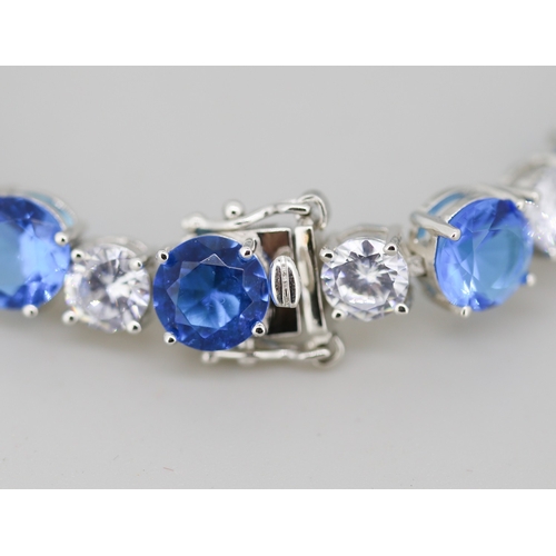 33 - Blue and White Cubic Zirconia Set Tennis Bracelet Mounted in Sterling Silver 20cm Long