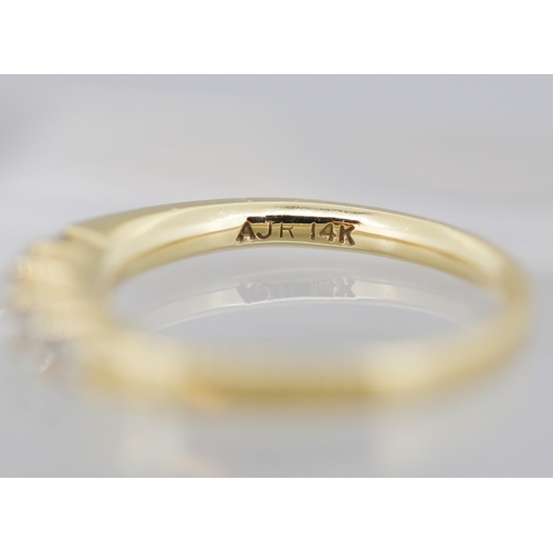 34 - Diamond Five Stone Set Ring Graduated Form Mounted in 14 Carat Yellow Gold Ring Size N and a Half