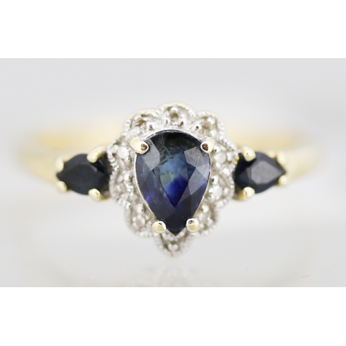 38 - Finely Detailed Sapphire Pear Cut Three Stone Ring with Further Diamond Insets Mounted in 14 Carat Y... 