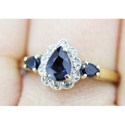 38 - Finely Detailed Sapphire Pear Cut Three Stone Ring with Further Diamond Insets Mounted in 14 Carat Y... 