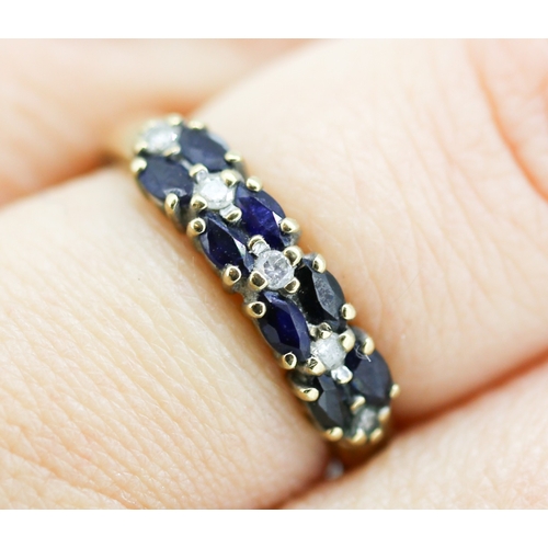 4 - Sapphire Marquise Cut Eight Stone Ring with Further Diamond Inset Mounted in 9 Carat Yellow Gold Rin... 