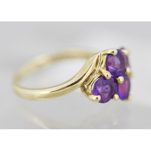 40 - Amethyst Four Stone Set Ring Mounted in 9 Carat Yellow Gold Ring Size K