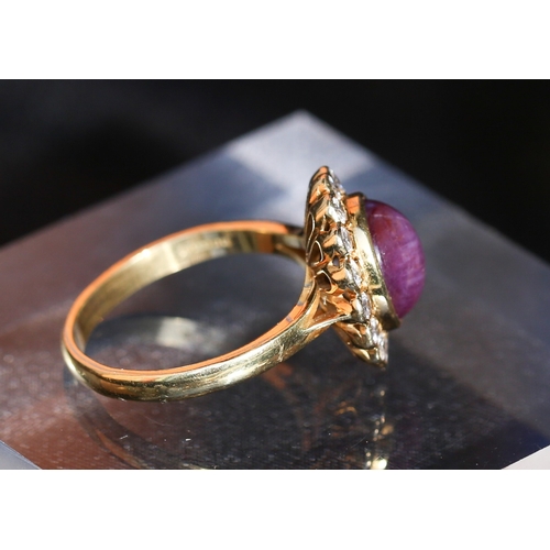 43 - Finely Detailed Star Ruby Centre Stone Ring with Diamond Set Halo Surround Mounted in 18 Carat Yello... 