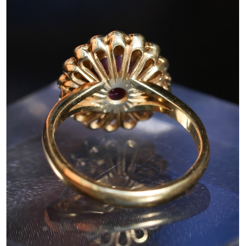 43 - Finely Detailed Star Ruby Centre Stone Ring with Diamond Set Halo Surround Mounted in 18 Carat Yello... 