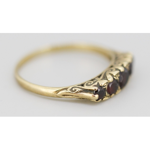 51 - Red Garnet Five Stone Graduated Form Ring Mounted in 9 Carat Yellow Gold Ring Size U and a Half