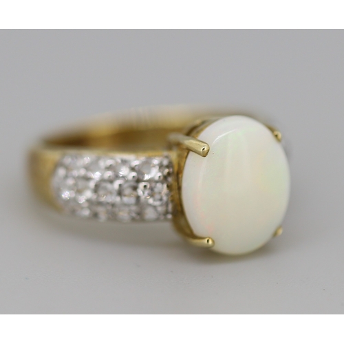52 - Opal Set Ring with Gemstone Cluster Set Shoulders Mounted in 9 Carat Yellow Gold Ring Size N