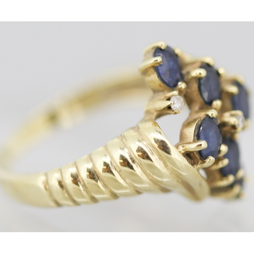 53 - Attractively Detailed Sapphire Six Stone Set Ring with Further Diamonds Insets Mounted in 9 Carat Ye... 