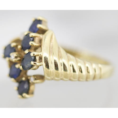 53 - Attractively Detailed Sapphire Six Stone Set Ring with Further Diamonds Insets Mounted in 9 Carat Ye... 