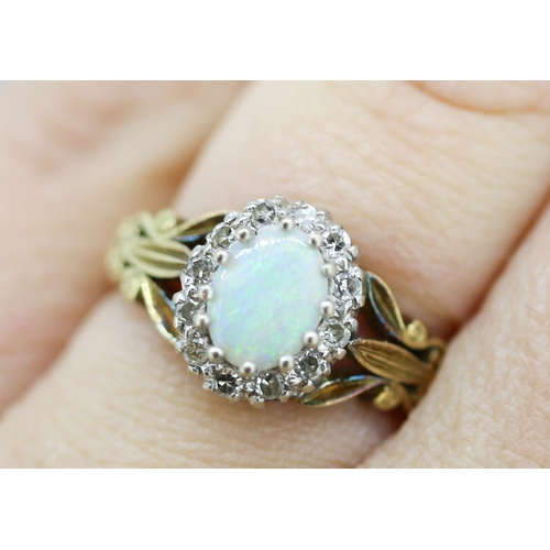 60 - Finely Detailed Opal Centre Stone Ring with Diamond Set Halo Surround Mounted in 18 Carat Yellow Gol... 