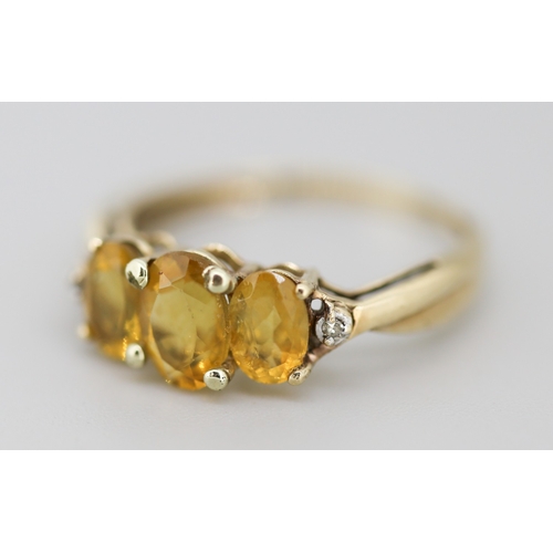 7 - Citrine Three Stone Ring with Diamond Inset to Shoulders Mounted in 9 Carat Yellow Gold Ring Size N ... 