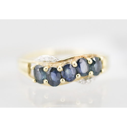 Sapphire Five Stone Set Ring with Diamond Insets Mounted in 9 Carat Yellow Gold Ring Size S
