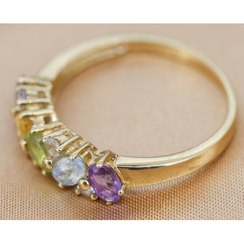 17 - Amethyst, Aquamarine, Peridot, Citrine and White Topaz Set Cluster Band Ring Mounted in 9 Carat Yell... 