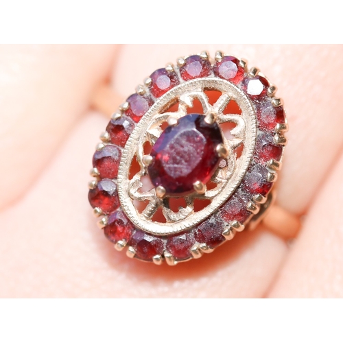 2 - Finely Detailed Red Garnet Set Cluster Ring Mounted in 9 Carat Yellow Gold Ring Size R