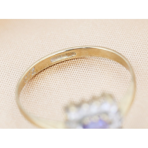 23 - Lilac and Blue Cubic Zirconia Set Cluster Ring Mounted in 9 Carat Yellow Gold Ring Size N and a Half
