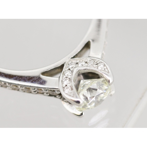 33 - Diamond Solitaire Four Claw Set Mounted in 18 Carat White Gold with Further Diamond Inset to Shoulde... 