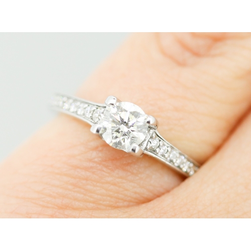 33 - Diamond Solitaire Four Claw Set Mounted in 18 Carat White Gold with Further Diamond Inset to Shoulde... 