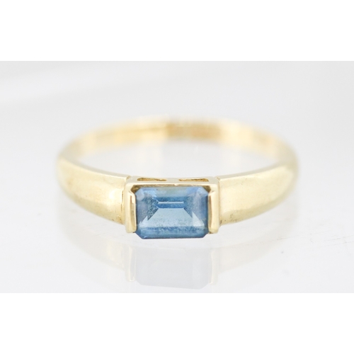 35 - Emerald Cut London Blue Topaz Single Stone Bar Set Ring Mounted in 9 Carat Yellow Gold Ring Size N