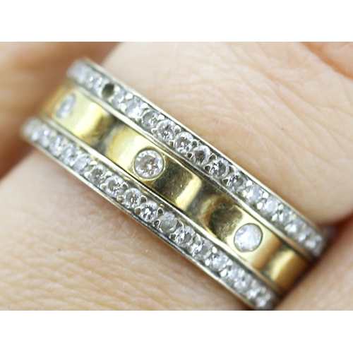 44 - Attractively Detailed Diamond Eternity Set Ring Mounted in 14 Carat Yellow and White Gold Ring Size ... 