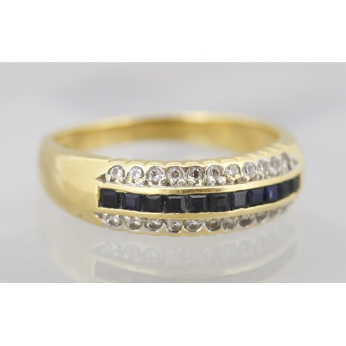 46 - Princess Cut Sapphire Set Ring with Further White Topaz Set to Sides Mounted in 18 Carat Yellow Gold... 