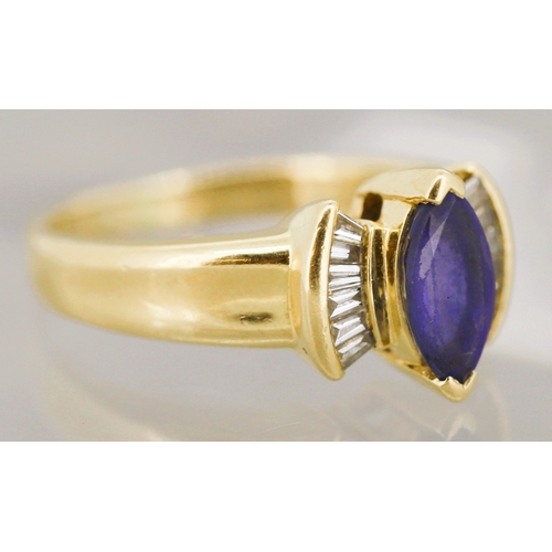 49 - Marquise Cut Tanzanite Set Bow Motif Ring with Tapered Baguette Cut Diamond Set Shoulders Mounted in... 