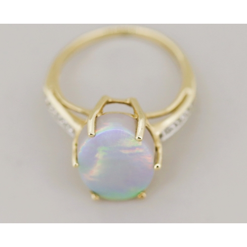 53 - Opal Set Ring with Further Diamond Inset to Shoulders Mounted in 9 Carat Yellow Gold Ring Size K
