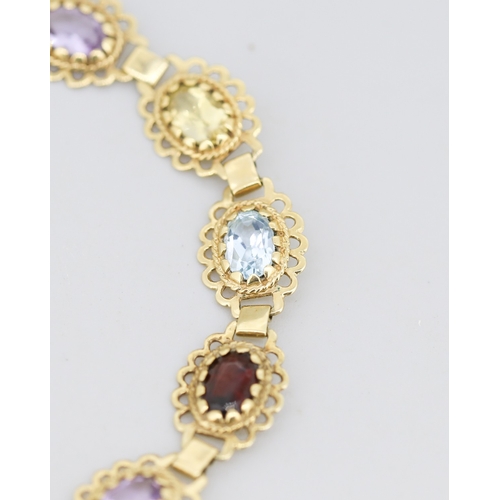56 - Finely Detailed Citrine, Amethyst, Garnet and Aquamarine Set Bracelet Mounted in 9 Carat Yellow Gold... 