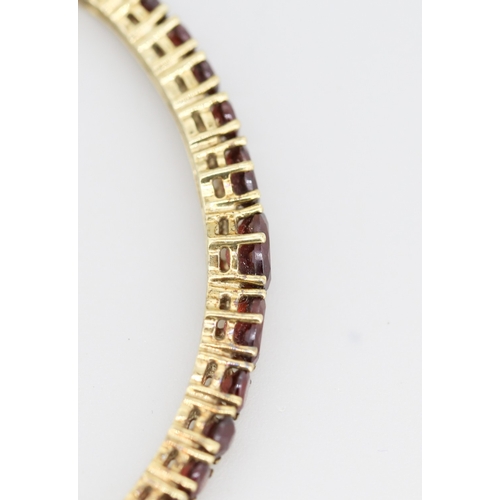 59 - Red Garnet Thirteen Stone Graduated Form Set Bangle Bracelet Mounted in 9 Carat Yellow Gold Inner Wi... 