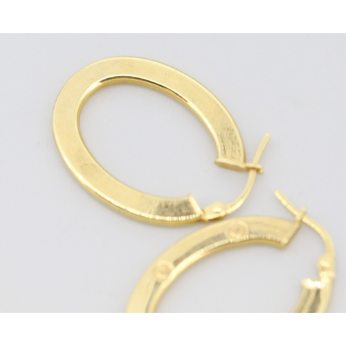 60 - Pair of Attractively Detailed 9 Carat Yellow Gold Oval Form Hoop Earrings 2.5cm High