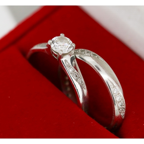 8 - Round Brilliant Cut Diamond Solitaire Ring with Further Diamond Inset to Shoulders Centre Stone .52 ... 