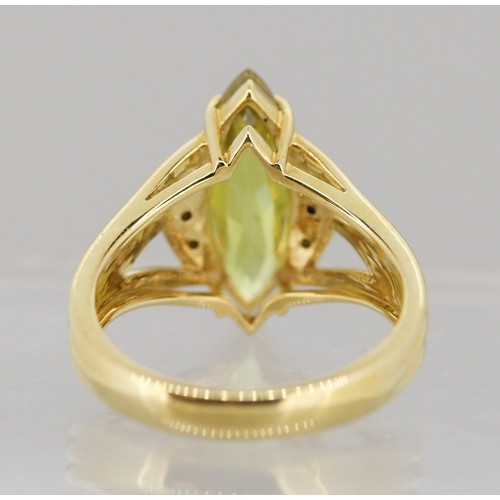 9 - Finely Detailed Marquise Cut Peridot Set Ring with Diamonds Set to Shoulders Mounted in 18 Carat Yel... 