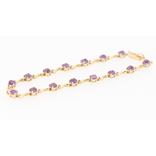 Amethyst Fifteen Stone Set S Link Bracelet, Mounted in 9 Carat Yellow Gold 19.5cm Long